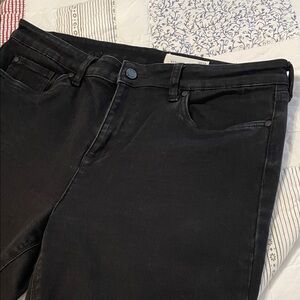 Vince Camuto Black Denim Stretch Jeans with shredded bottom hem detail